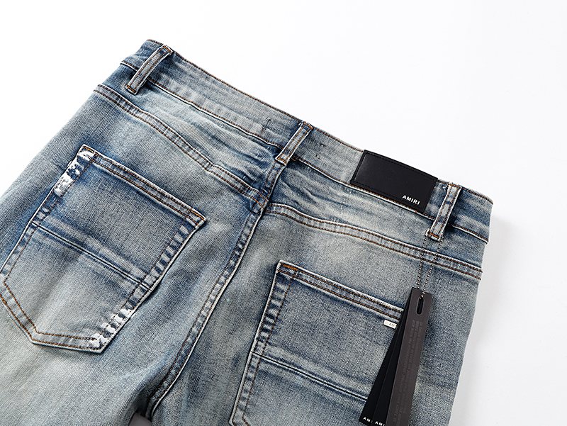 Amiri Light Blue Distressed Leg Print Jeans — detail