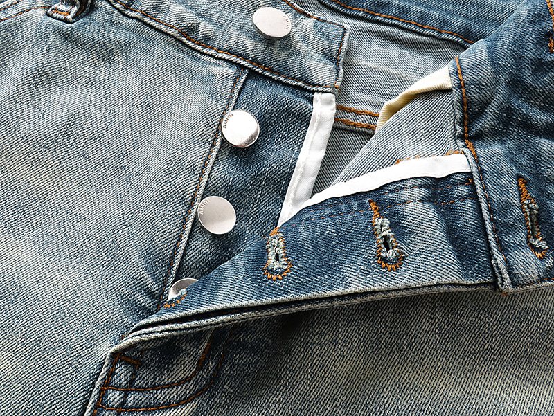 AMIRI Light Blue Distressed Denim Shorts — detail