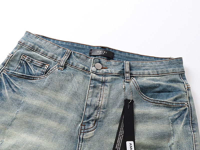 AMIRI Light Blue Distressed Denim Shorts — detail