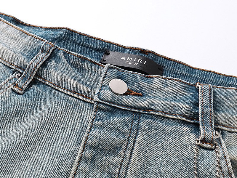 AMIRI Light Blue Monogram Denim Shorts — detail