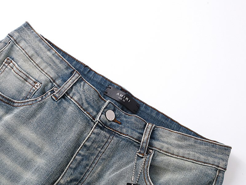 AMIRI Light Blue Distressed Denim Shorts — detail