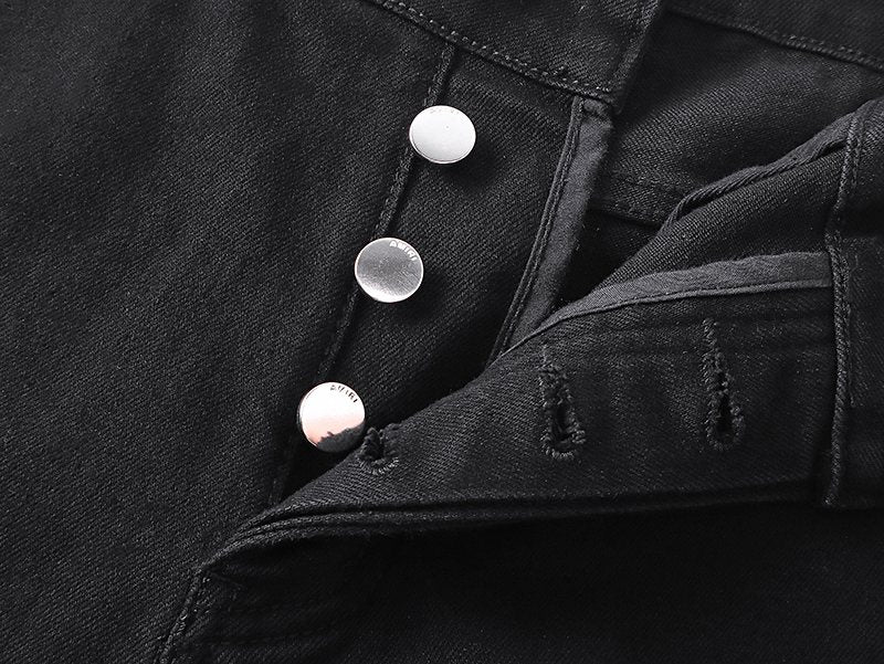 AMIRI Distressed Black Denim Shorts — detail