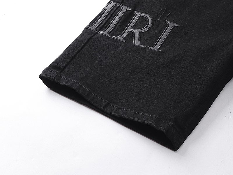 AMIRI Distressed Black Denim Shorts — detail