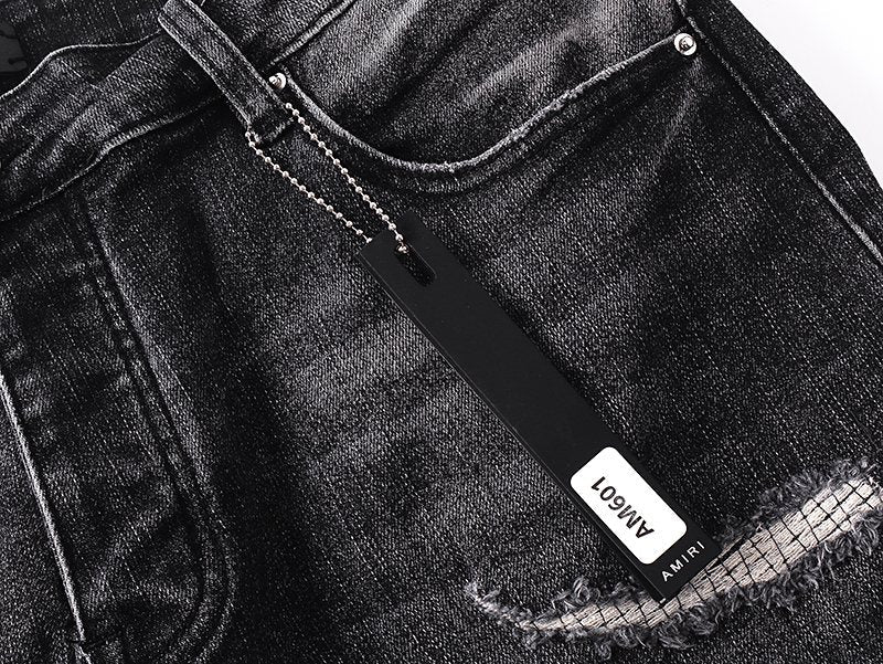 AMIRI Washed Black Embroidered Denim Shorts — hang_tag
