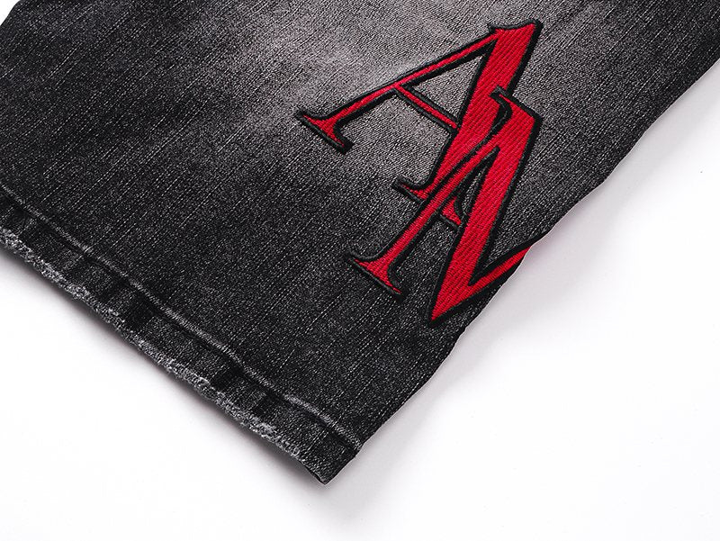 AMIRI Washed Black Embroidered Denim Shorts — detail