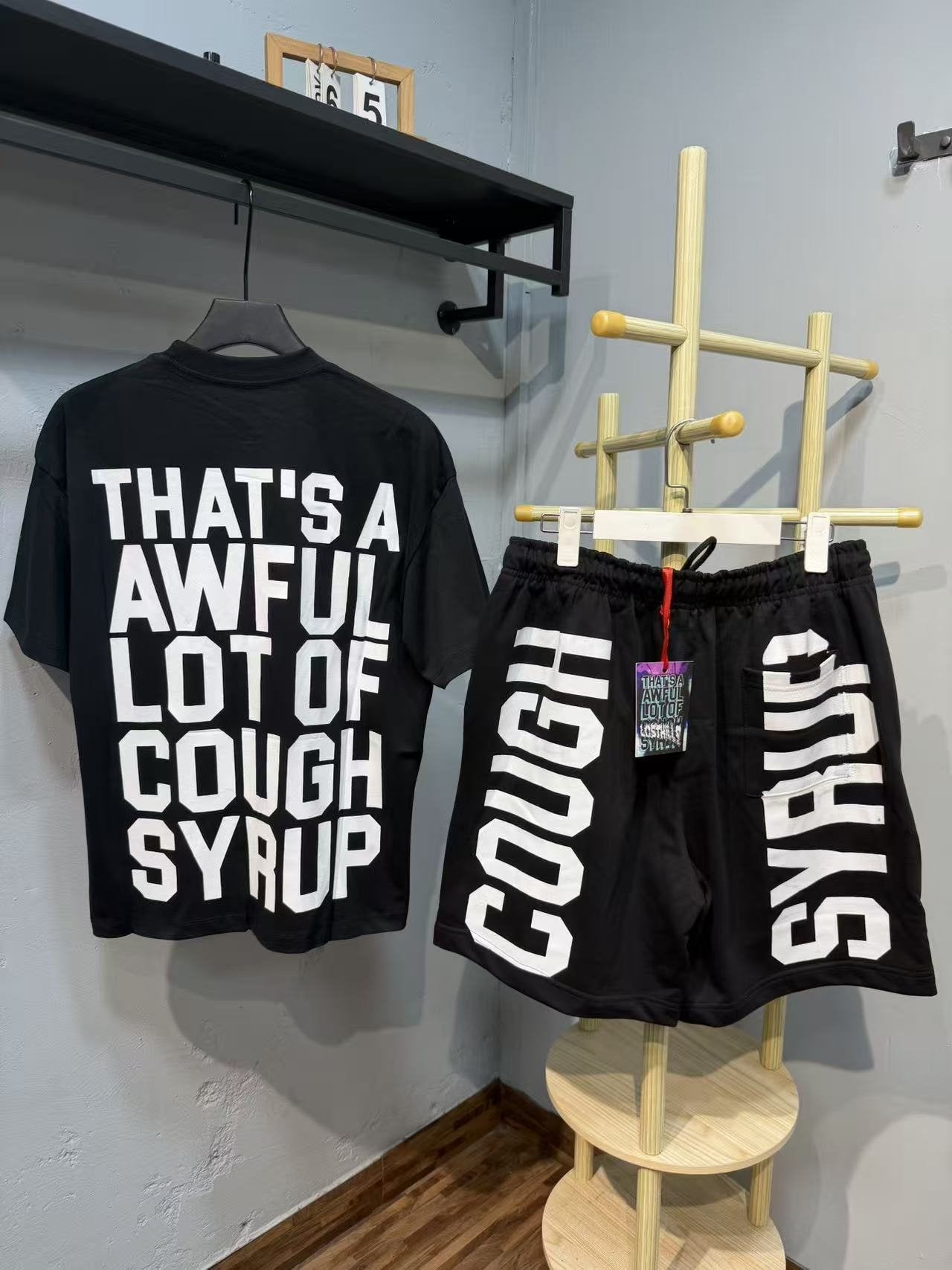 THAT'S A AWFUL LOT OF COUGH SYRUP Graphic Short-Sleeve Set — back