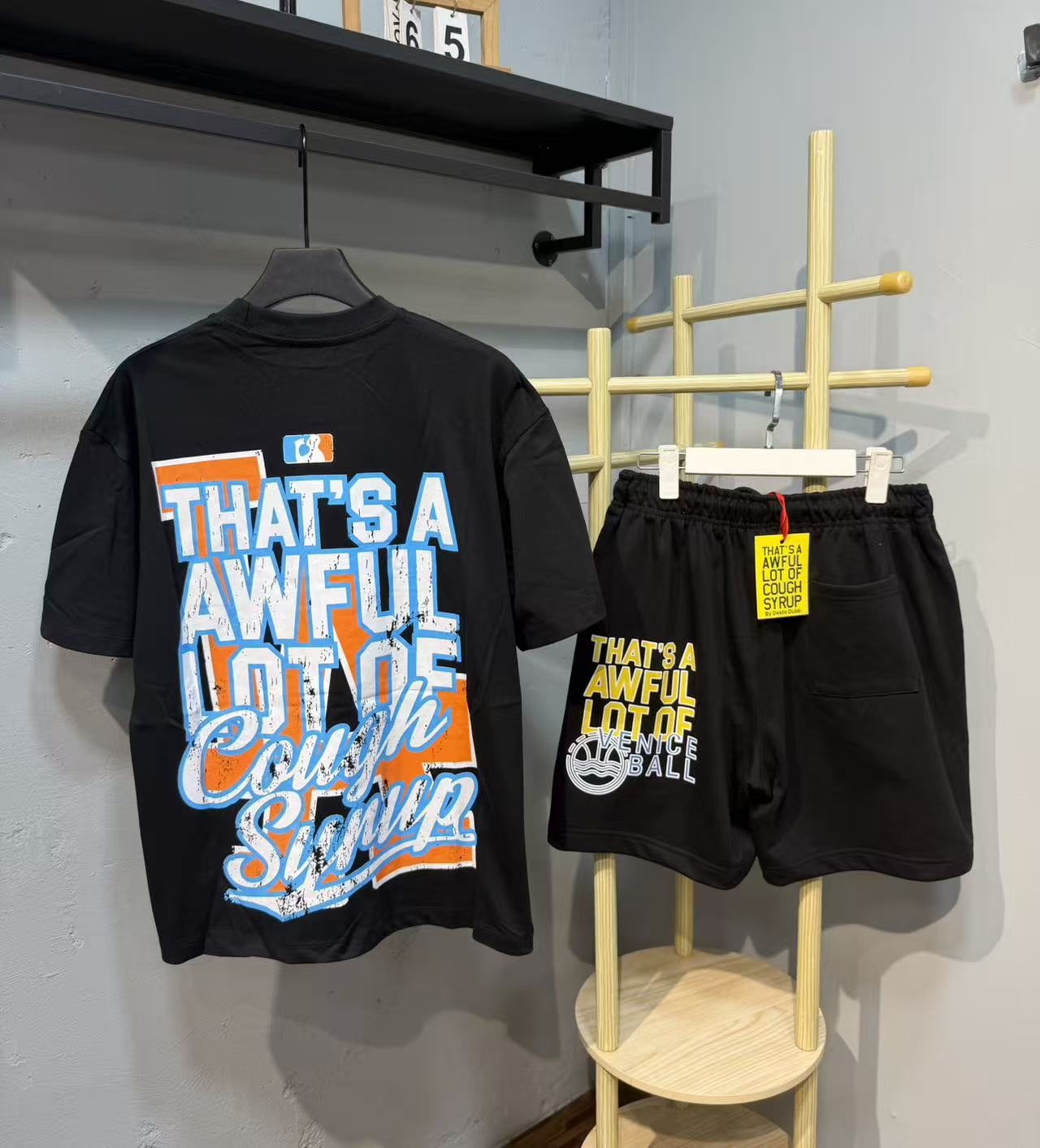 THAT'S A AWFUL LOT OF COUGH SYRUP LA Graphic Short-Sleeve Set — back