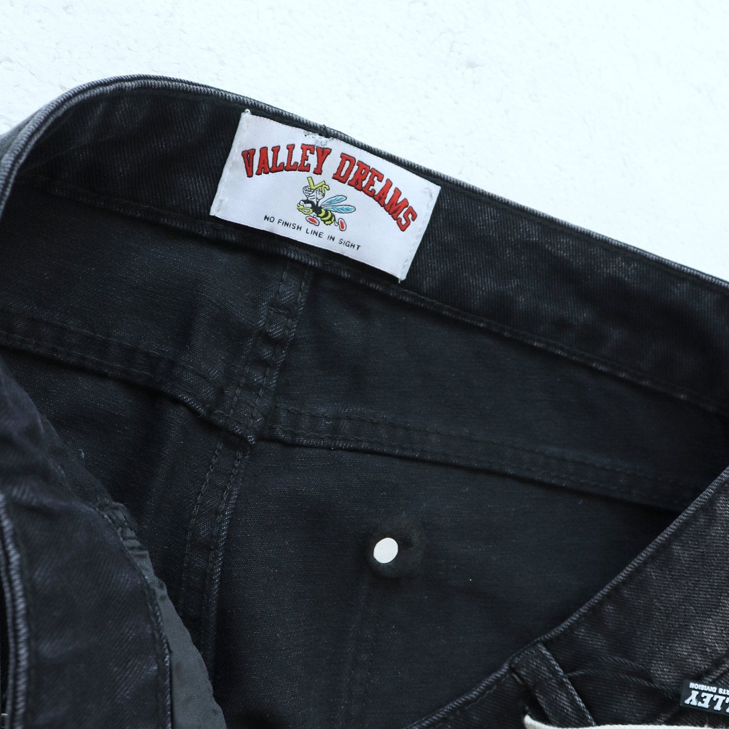 Valley Dreams Lives Forever Paint-Splatter Jeans — neck_label