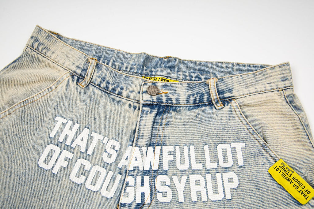 THAT'S A AWFUL LOT OF COUGH SYRUP Washed Denim Graphic Shorts — detail