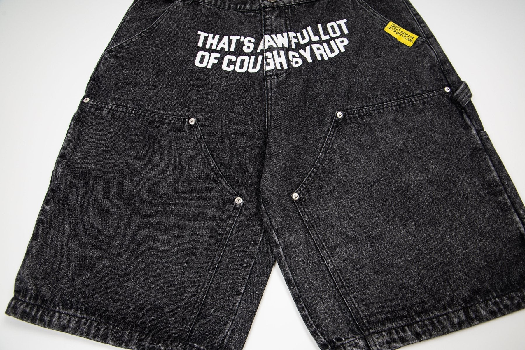 THAT'S A AWFUL LOT OF COUGH SYRUP Washed Denim Graphic Shorts — front