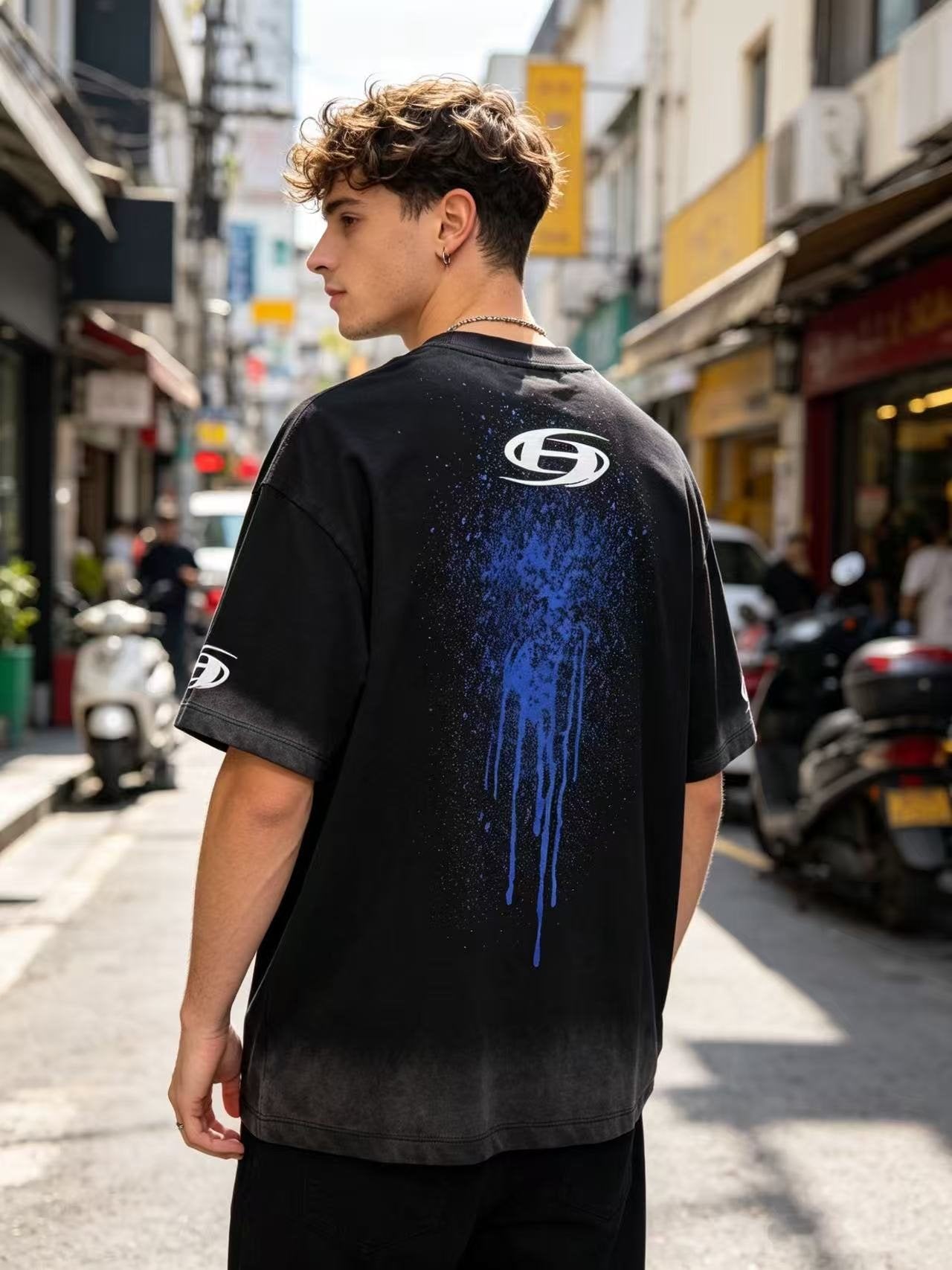Hellstar STLDOS Blue Spray Graphic T-Shirt — model