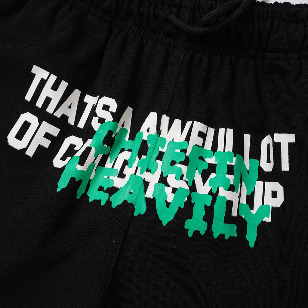 THAT'S A AWFUL LOT OF COUGH SYRUP Drawstring Graphic Shorts — detail