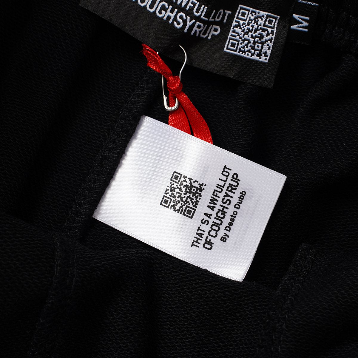 THAT'S A AWFUL LOT OF COUGH SYRUP Portrait Graphic Shorts — neck_label