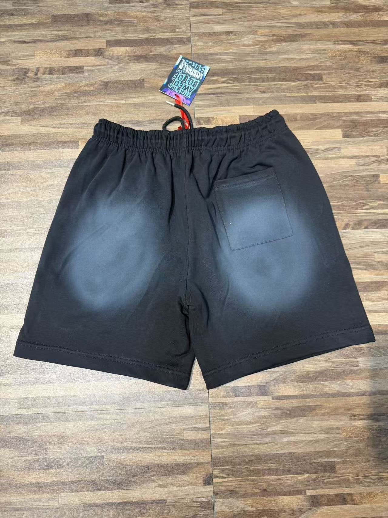 THAT'S A AWFUL LOT OF COUGH SYRUP Black Front Graphic Shorts — back