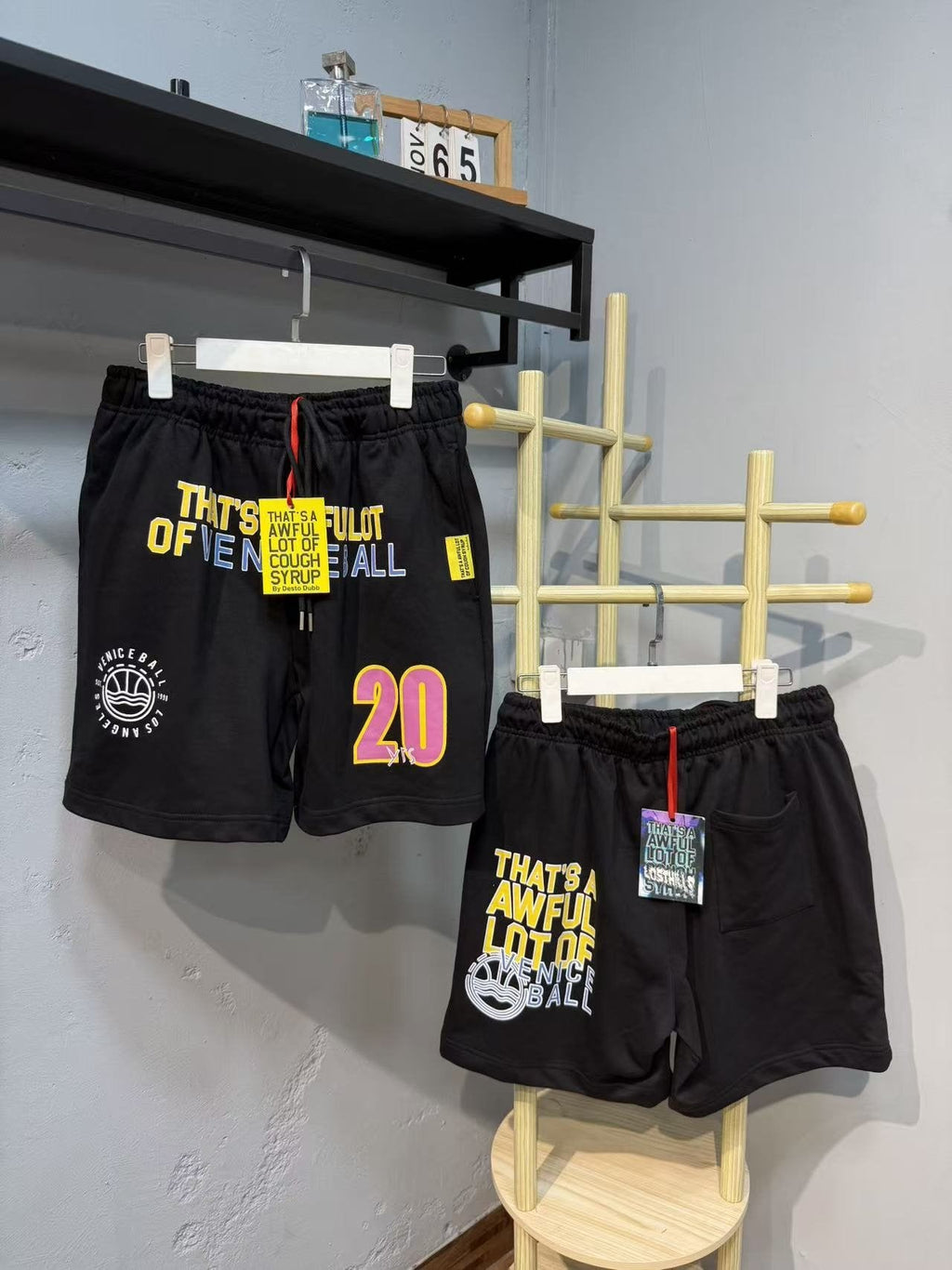 THAT'S A AWFUL LOT OF COUGH SYRUP Venice Ball Graphic Shorts — context