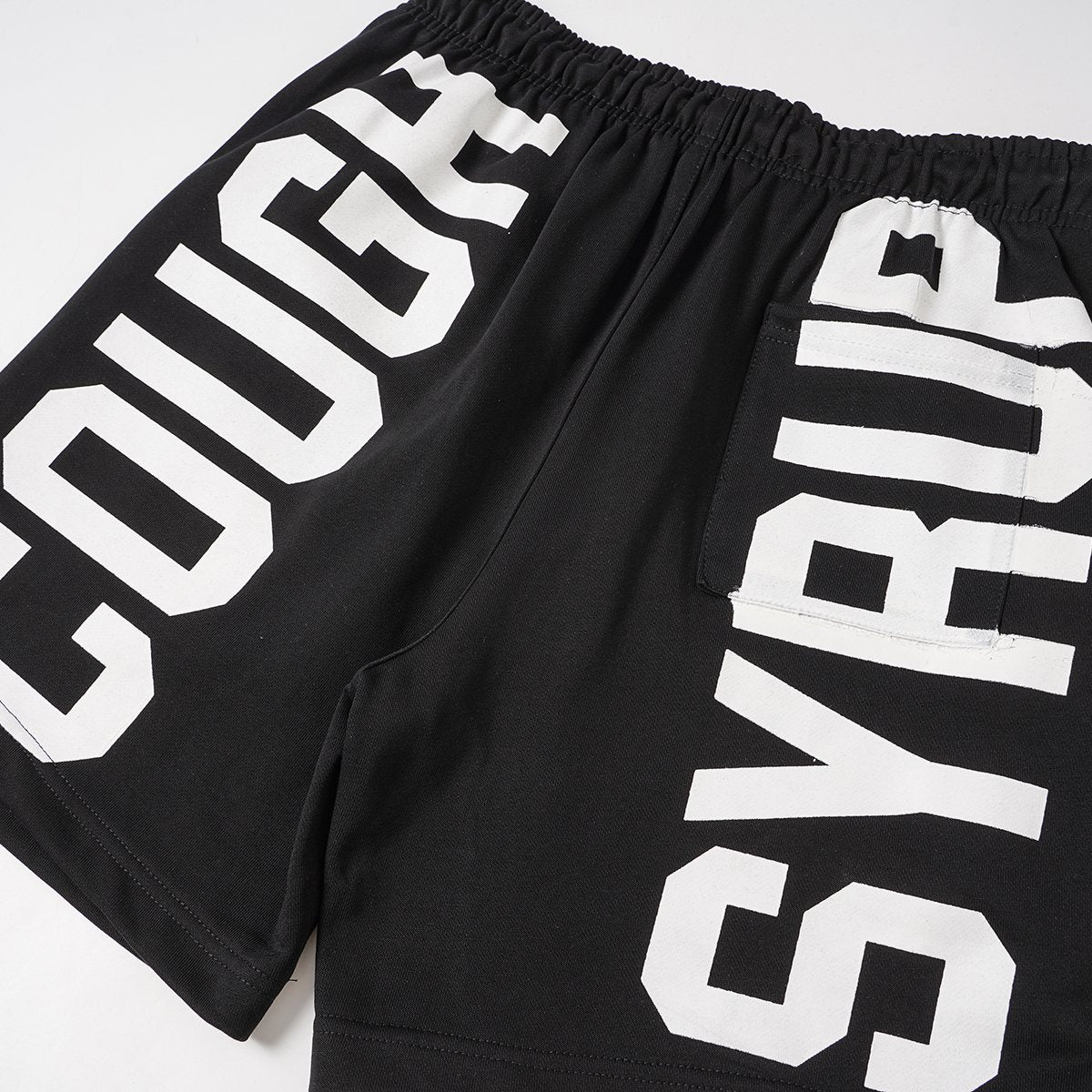 THAT'S A AWFUL LOT OF COUGH SYRUP Black Graphic Shorts — detail