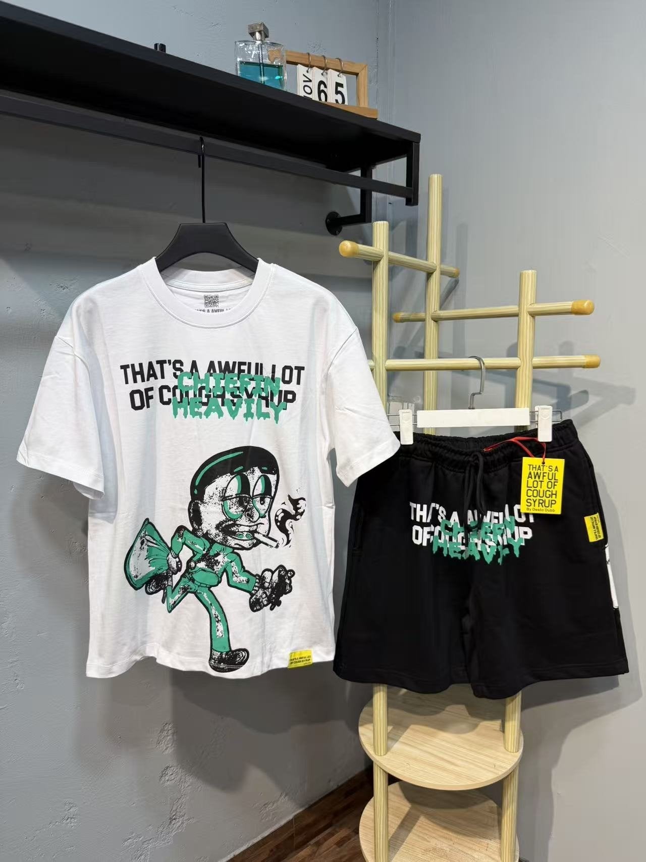 THAT'S A AWFUL LOT OF COUGH SYRUP Graphic Short-Sleeve Set — front