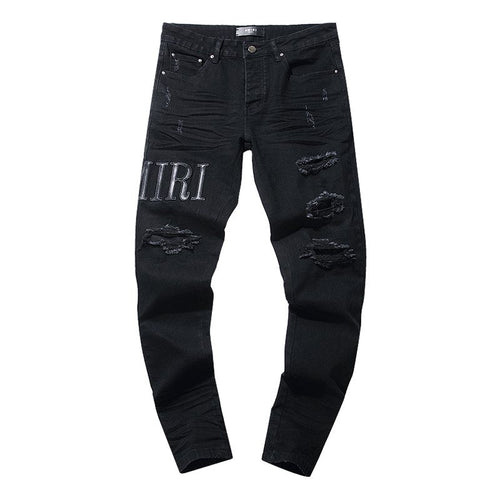 AMIRI Black Distressed Lettering Jeans — hero