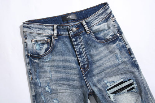 AMIRI Light Blue Distressed Jeans — front