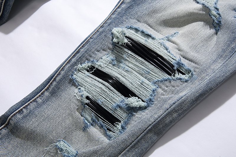 AMIRI Light Blue Distressed Jeans — detail