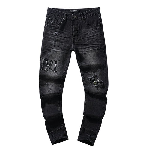 AMIRI Rhinestone Washed Denim Jeans — front