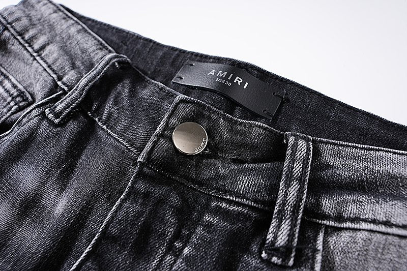 AMIRI Washed Black Distressed Jeans — detail
