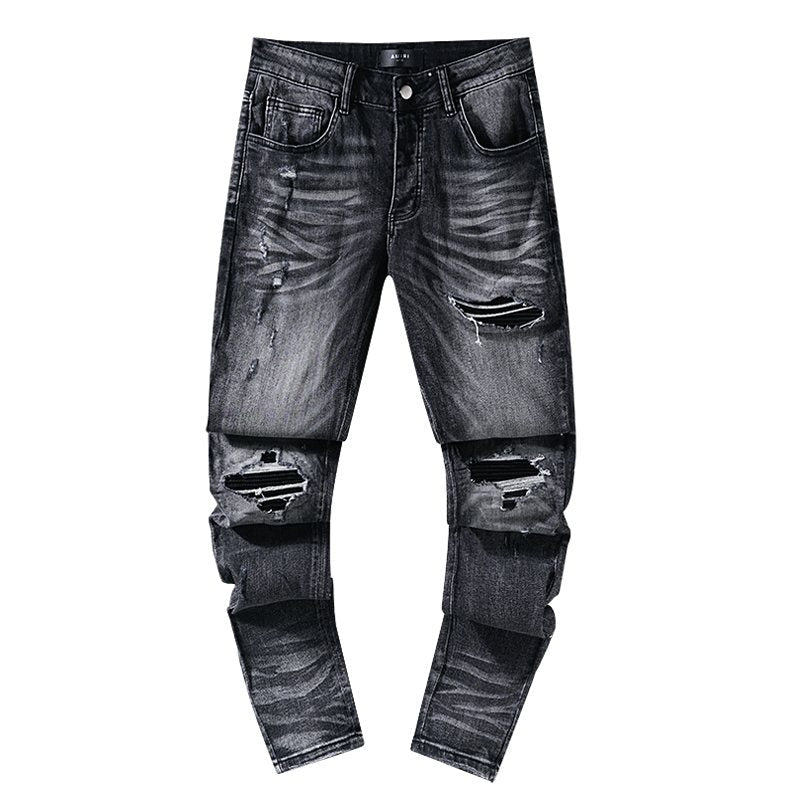 AMIRI Washed Black Distressed Jeans — hero