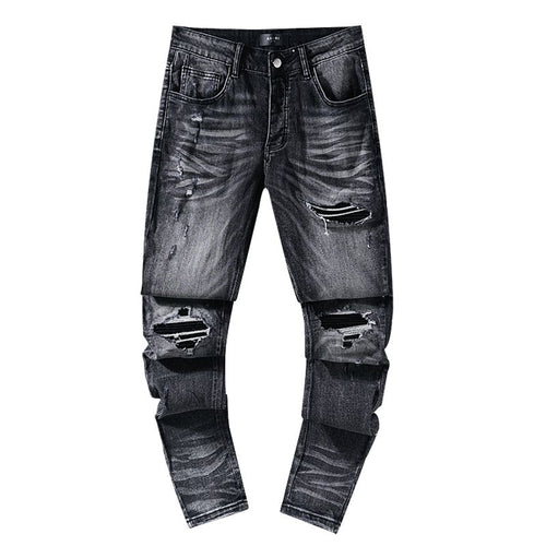 AMIRI Washed Black Distressed Jeans — hero