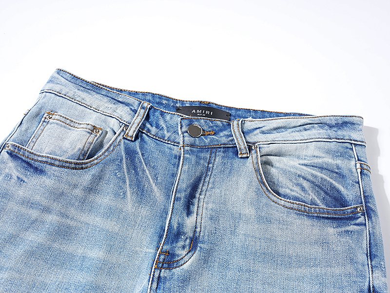 AMIRI Light Blue Distressed Paneled Jeans — detail