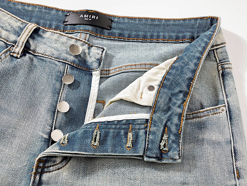 AMIRI Light Blue Distressed Ripped Knee Jeans — detail
