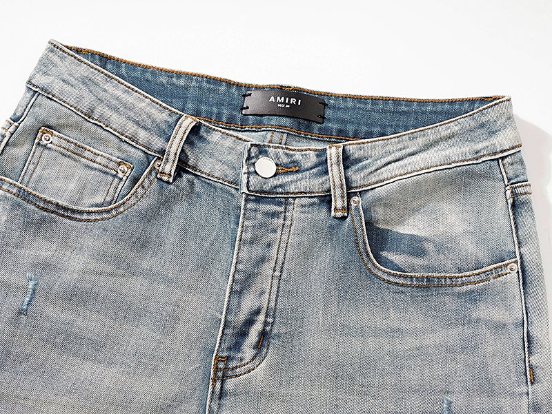 AMIRI Light Blue Distressed Ripped Knee Jeans — detail