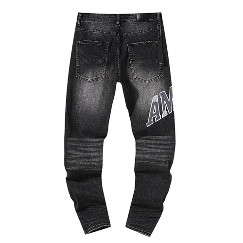 AMIRI Distressed Washed Black Graphic Jeans — back