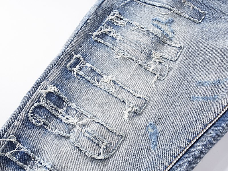 AMIRI Light Blue Distressed Ripped Knee Jeans — detail