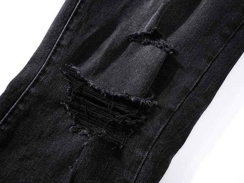 AMIRI Distressed Black Washed Jeans — detail