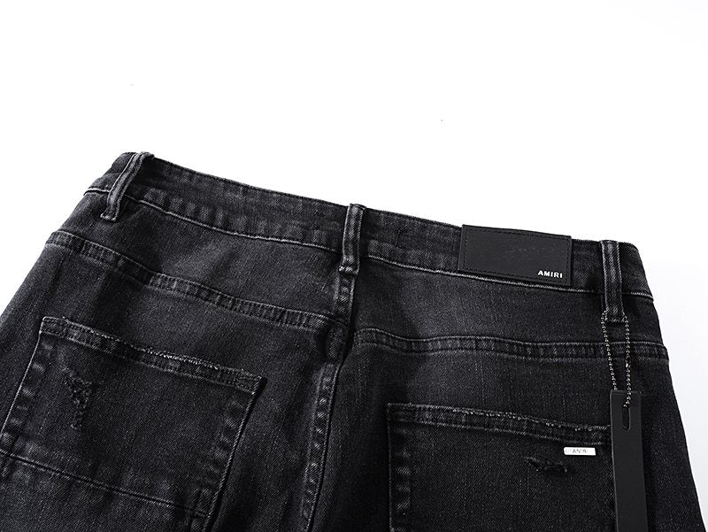 AMIRI Distressed Black Washed Jeans — detail