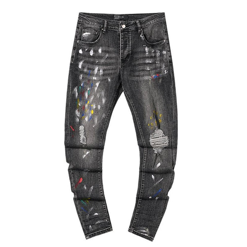 AMIRI Paint-Splatter Distressed Jeans — hero