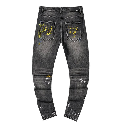 AMIRI Paint-Splatter Distressed Jeans — back