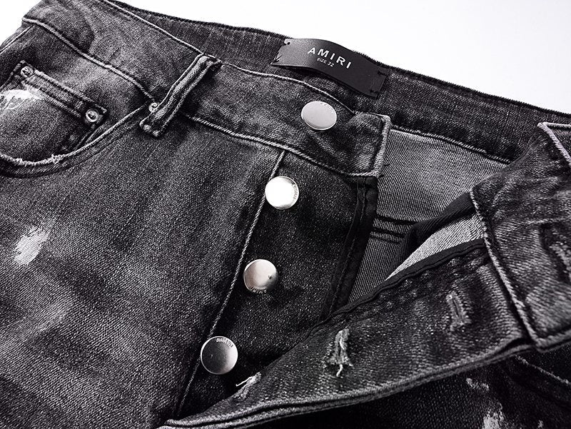 AMIRI Paint-Splatter Distressed Jeans — detail