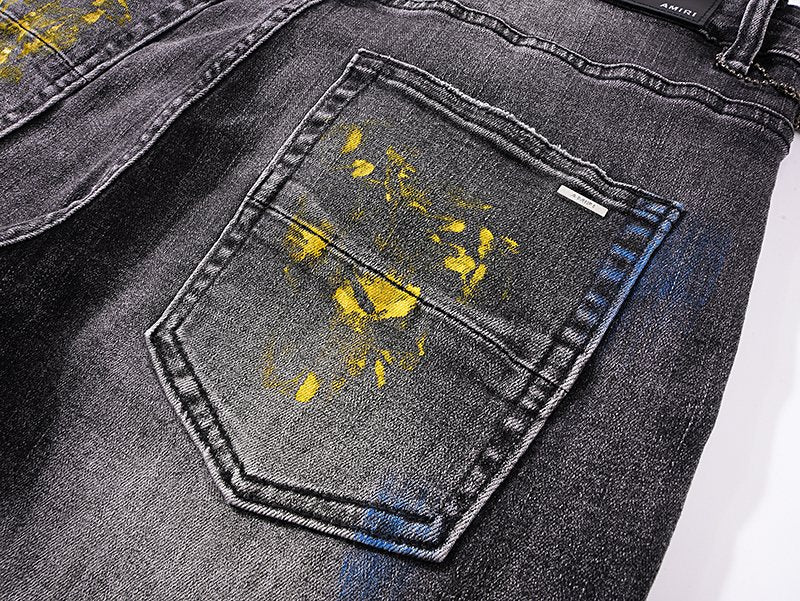 AMIRI Paint-Splatter Distressed Jeans — detail