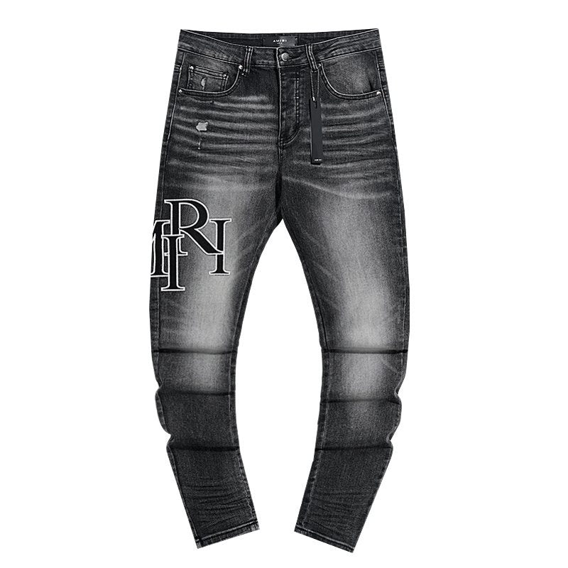 AMIRI Washed Black Embroidered Jeans — hero