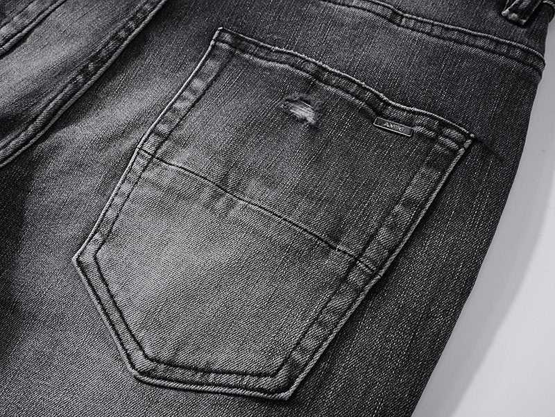 AMIRI Washed Black Embroidered Jeans — detail