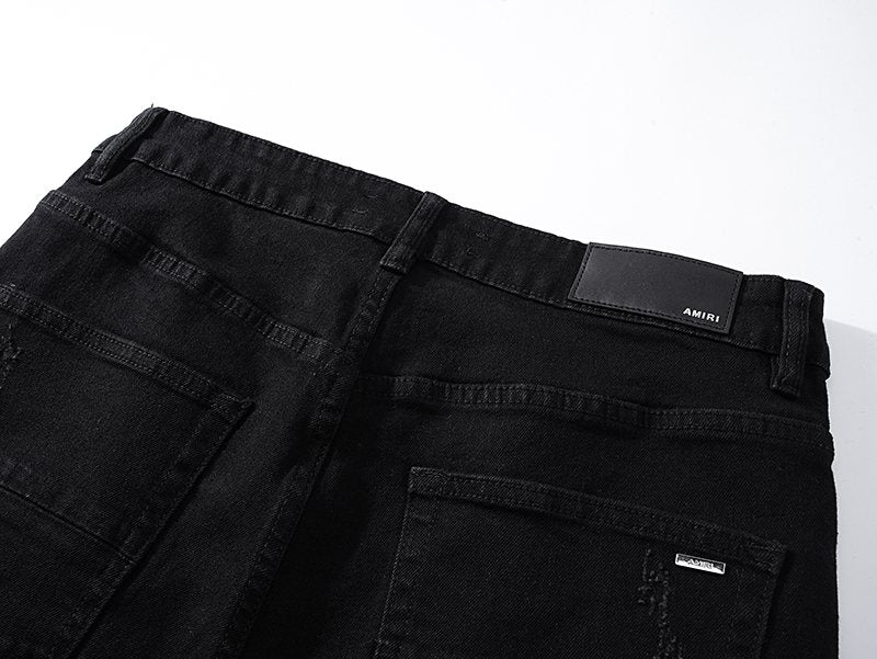AMIRI Black Distressed Moto Jeans — detail