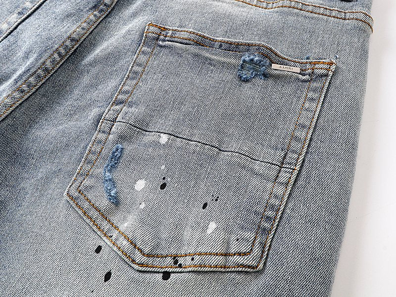 AMIRI Light Blue Distressed Paint Splatter Jeans — detail