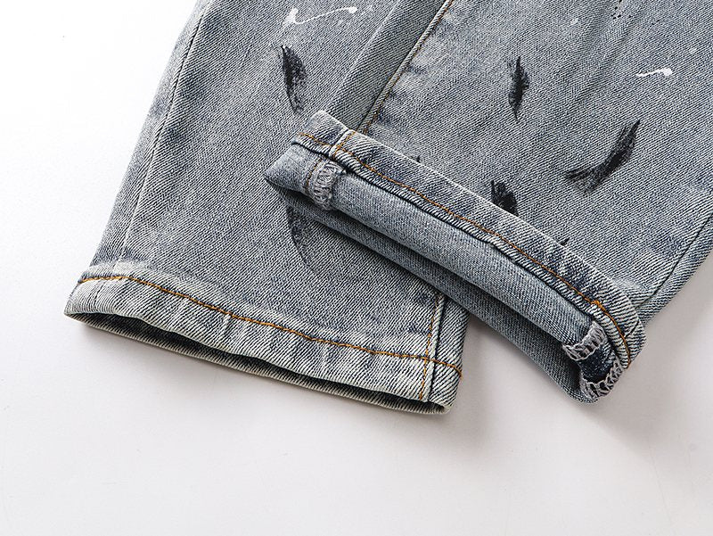 AMIRI Light Blue Distressed Paint Splatter Jeans — detail