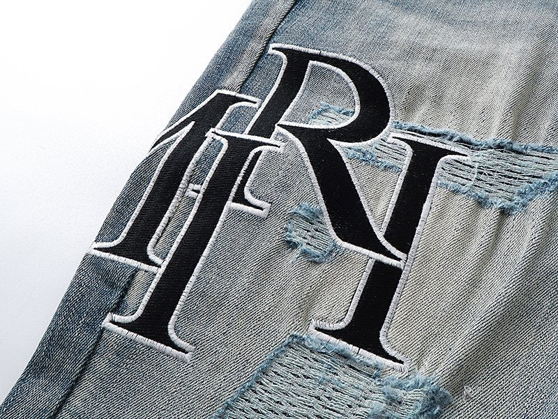 AMIRI Light Blue Embroidered Jeans — detail