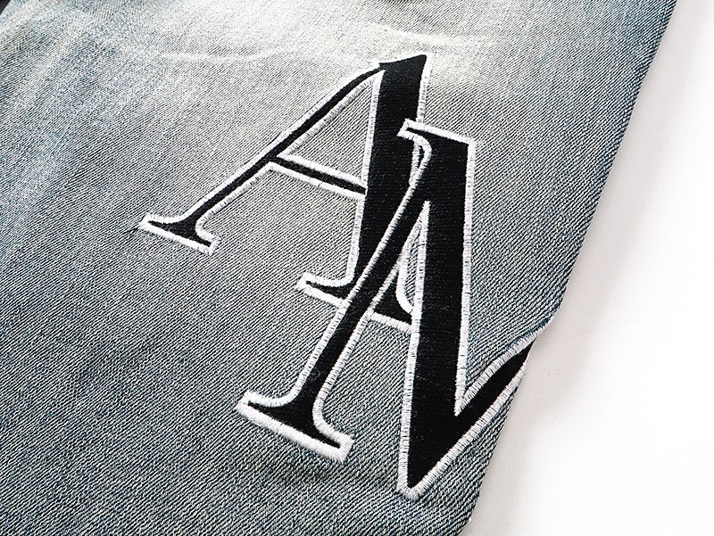 AMIRI Light Blue Embroidered Jeans — detail