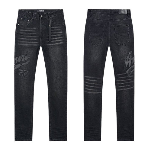 AMIRI Black Washed Graphic Jeans — hero