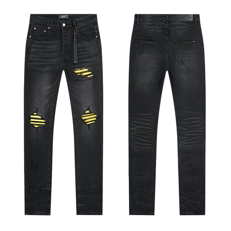 AMIRI Yellow-Backed Distressed Black Jeans — hero