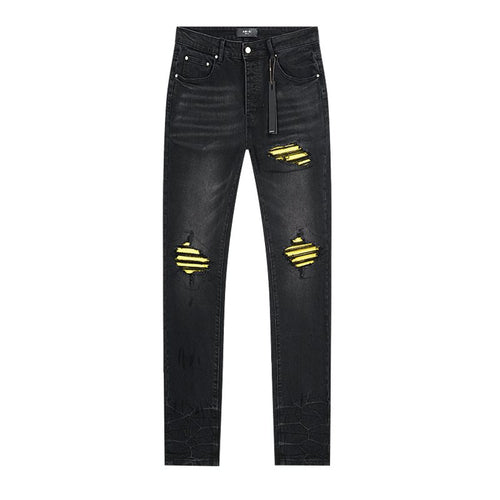 AMIRI Yellow-Backed Distressed Black Jeans — front
