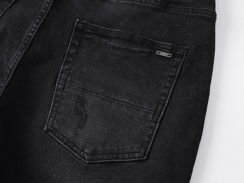 AMIRI Yellow-Backed Distressed Black Jeans — detail
